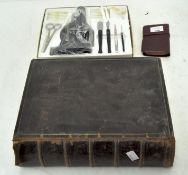 A 19th century leather bound family Bible, together with a Regent microscope,