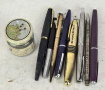 A selection of pens and pencils, including platinum examples,