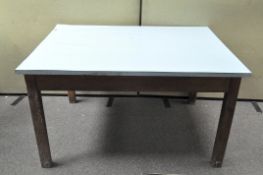 A vintage two drawer kitchen table,