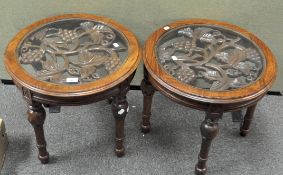 Two modern hardwood coffee tables, with carved fruit and vine tops, under glass,