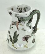 A late 19th century wash jug by George Jones, decorated with printed and painted animals and birds,