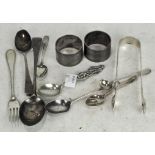 A collection of silver wares, to include a Georgian set of sugar tongs, Georgian dessert spoon,