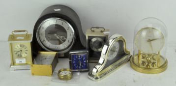 A selection of modern clocks, including Quartz carriage clocks,