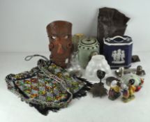 Assorted collectables including jelly moulds, tins,