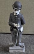 A Spanish ceramic figure depicting Charlie Chaplin,