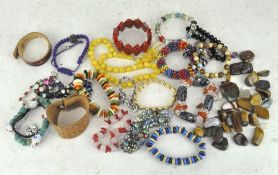 An assortment of costume jewellery, comprising necklaces,