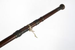 A vintage three piece dabbing rod, in the style of a Hardy's Greenheart,