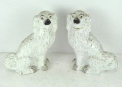 A pair of Staffordshire pottery dogs, 19th century,