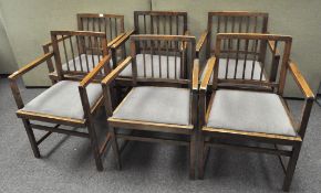 Six retro oak spindle back armchairs, with drop-in seats, on square legs,