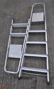 Two metal step ladders,