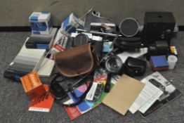 A collection of cameras and associated equipment, to include a Yashica TL electro X film camera,