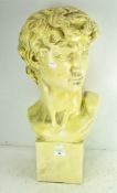 A large decorative bust of a man, in the classical style,