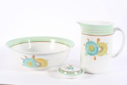 A Wilkinson wash set, painted in a Clarice Cliff 'Rhodanthe' style design,