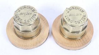 Two brass hub caps mounted as paperweights, by J Bingham, Builder, Long Sutton,