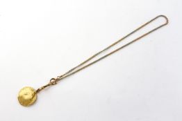 A worn George III gold Guinea coin fitted to a 14 inch curb chain having a bolt and swivel