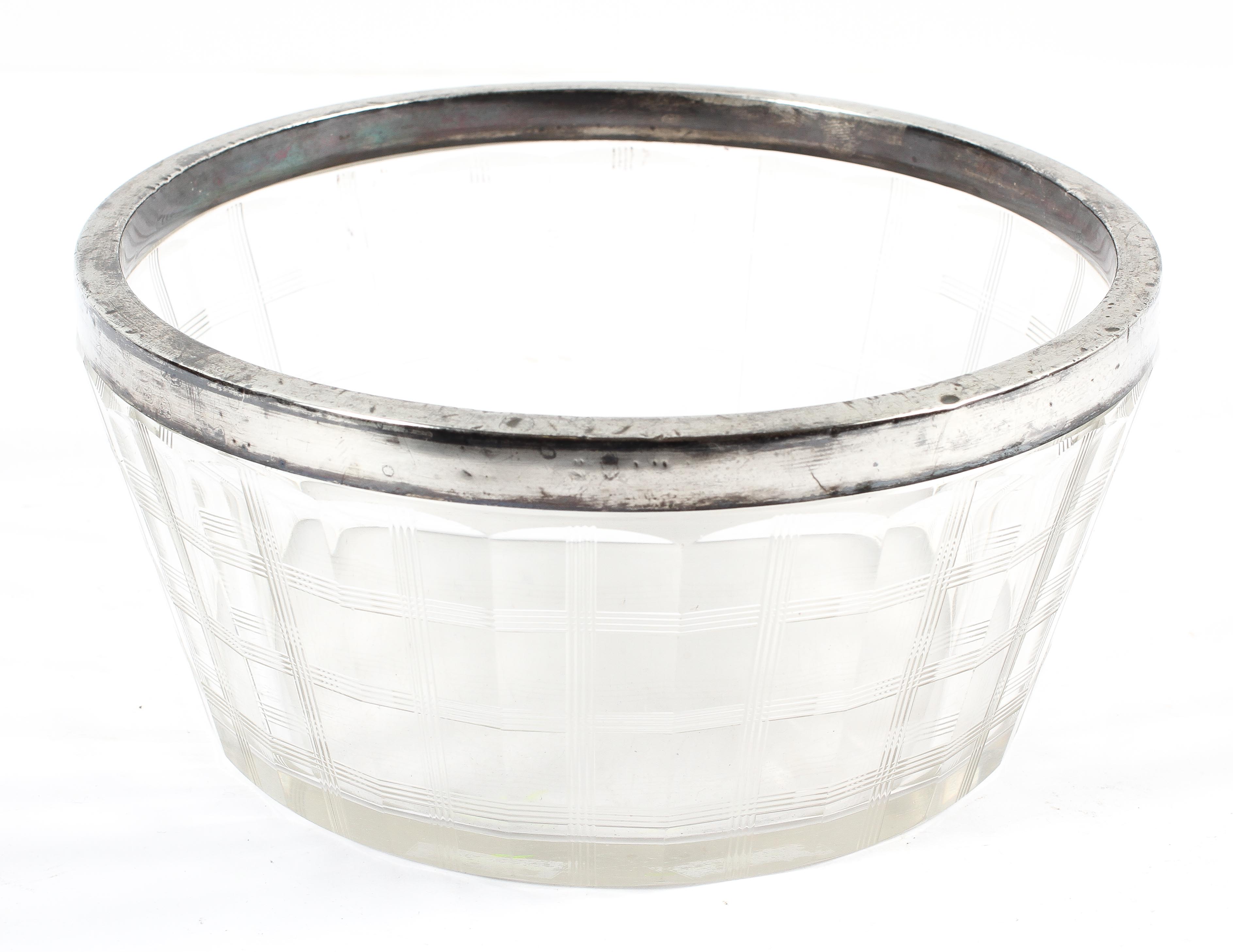 An Edwardian silver-mounted cut glass bowl, panel cut and cut with linear bands,