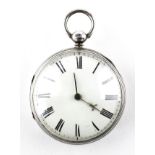 A large open face pocket watch. Circular white dial with roman numerals. Key wound movement.