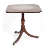 A Regency mahogany tilt top tea table, with reeded splayed legs and baluster stem,