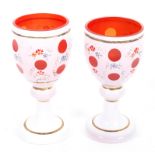 Two Bohemian mid-19th century style cased glass goblets, 20th century,