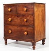 A Victorian mahogany chest of drawers, with two short drawers above two long graduated drawers,
