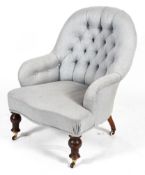 A Victorian button back chair, with pale blue herring bone upholstery and turned front legs,
