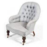 A Victorian button back chair, with pale blue herring bone upholstery and turned front legs,