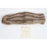 A vintage mink stole with silver silk lining, with zip fastening,