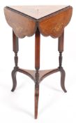 A Victorian rosewood inlaid triangular-shaped occasional table