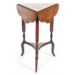 A Victorian rosewood inlaid triangular-shaped occasional table