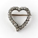 A yellow and white metal open heart brooch set with twenty four old European cut diamonds