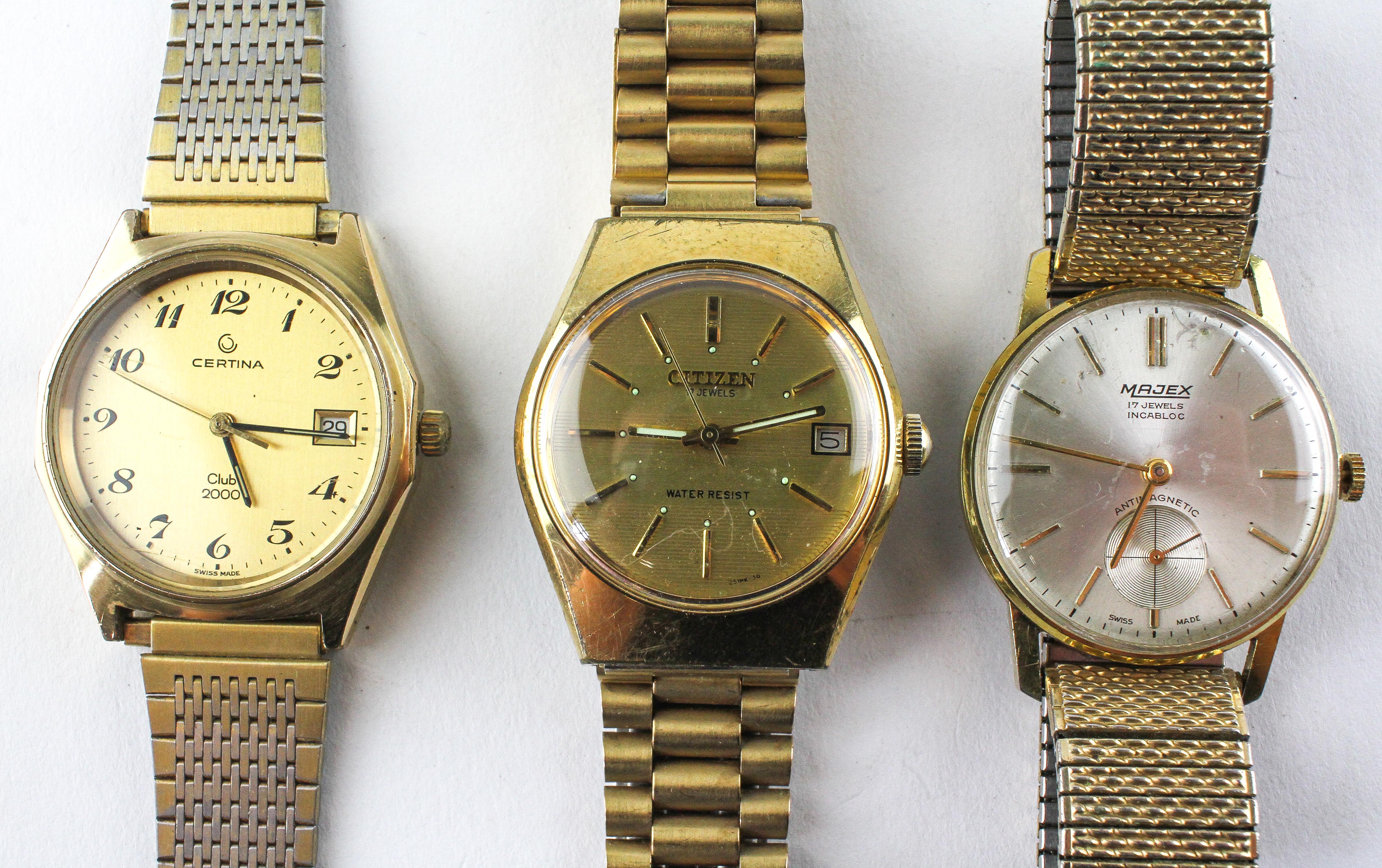 A collection of three gold plated manual wind bracelet wristwatches