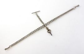 A sterling silver graduated 12 inch albert chain with double swivel, T bar and fitted key.
