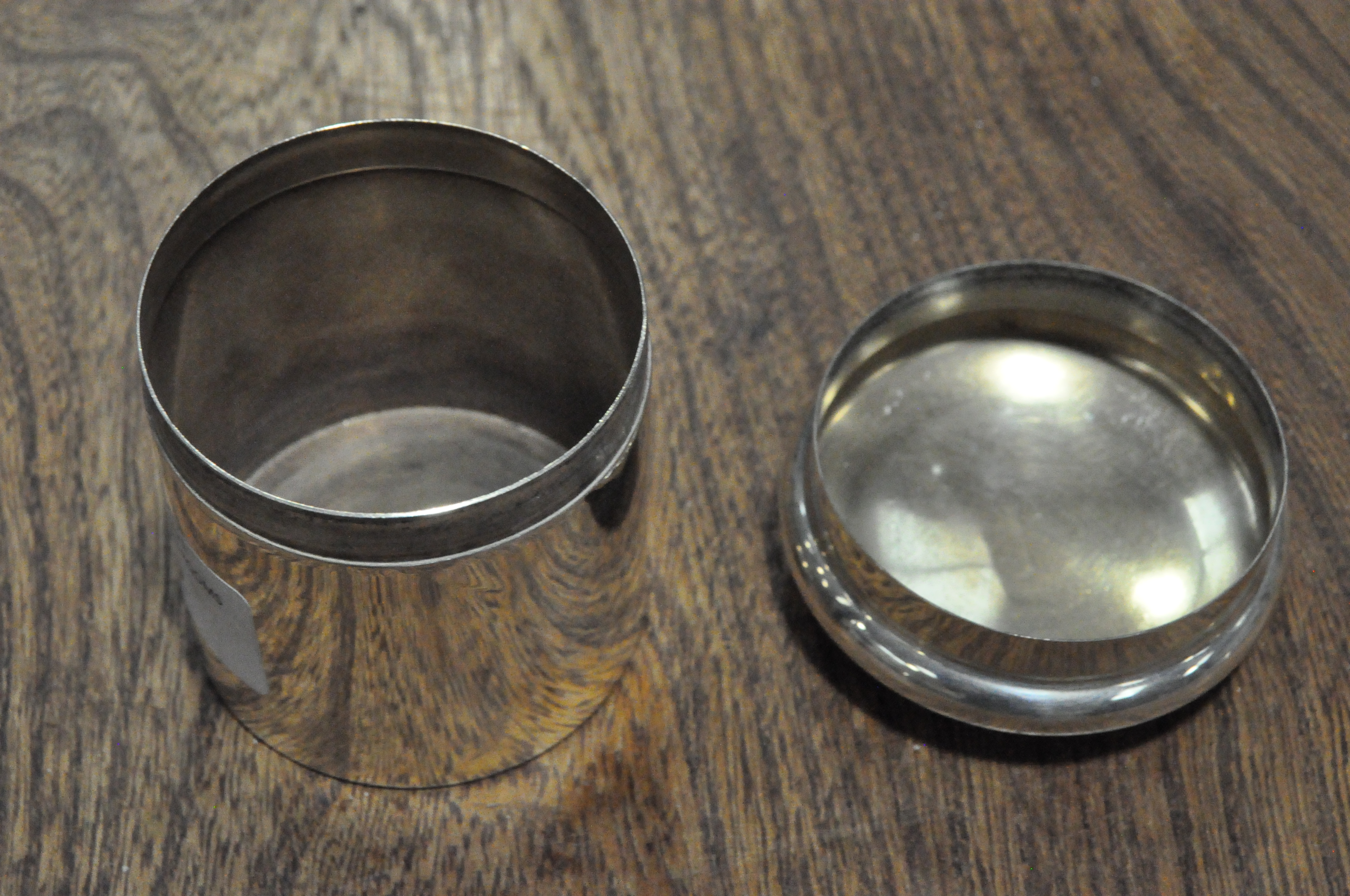 A selection of silver wares, to include a lidded pot of cylindrical form, three napkin rings, - Image 6 of 11