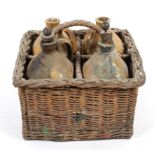 A set of four 19th century stoneware liqueur flasks, including brandy and Irish whisky,