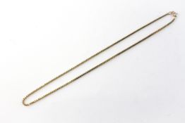 A yellow metal 18 inch box chain, bolt ring clasp. Hallmarked 9ct gold.