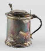 An Elizabeth II silver mustard pot, of cylindrical form with blue glass liner,