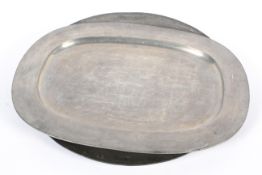 Two pewter oval platters and a charger, 18th/19th century, un-decorated,