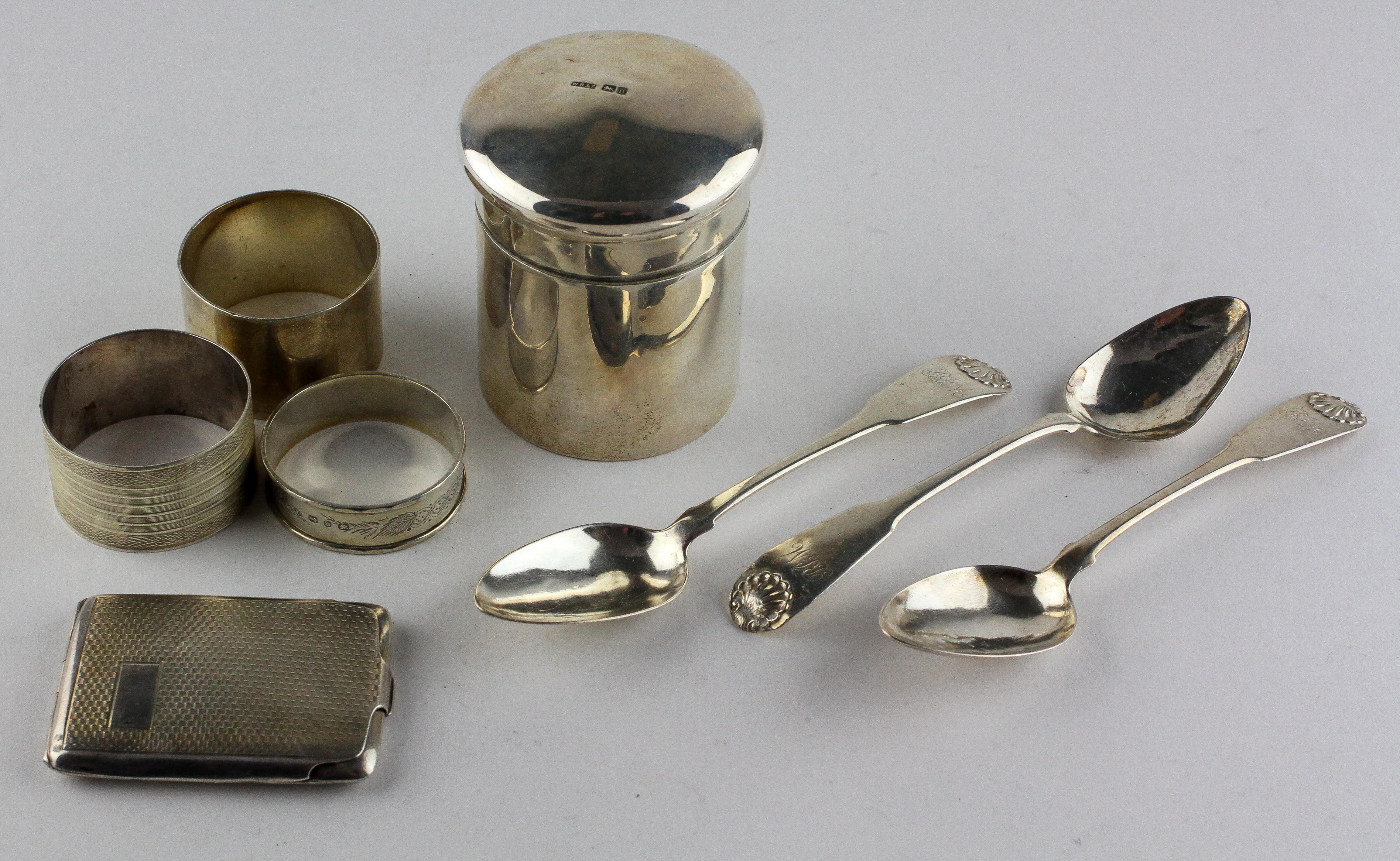 A selection of silver wares, to include a lidded pot of cylindrical form, three napkin rings,
