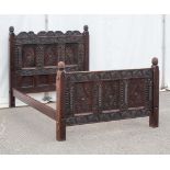 A Wood Carvers Guild Double bed,