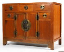 A Chinese elm cabinet,