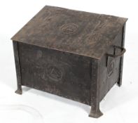 An Arts and Crafts steel coal scuttle, with hinged cover and twin handles,