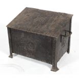 An Arts and Crafts steel coal scuttle, with hinged cover and twin handles,