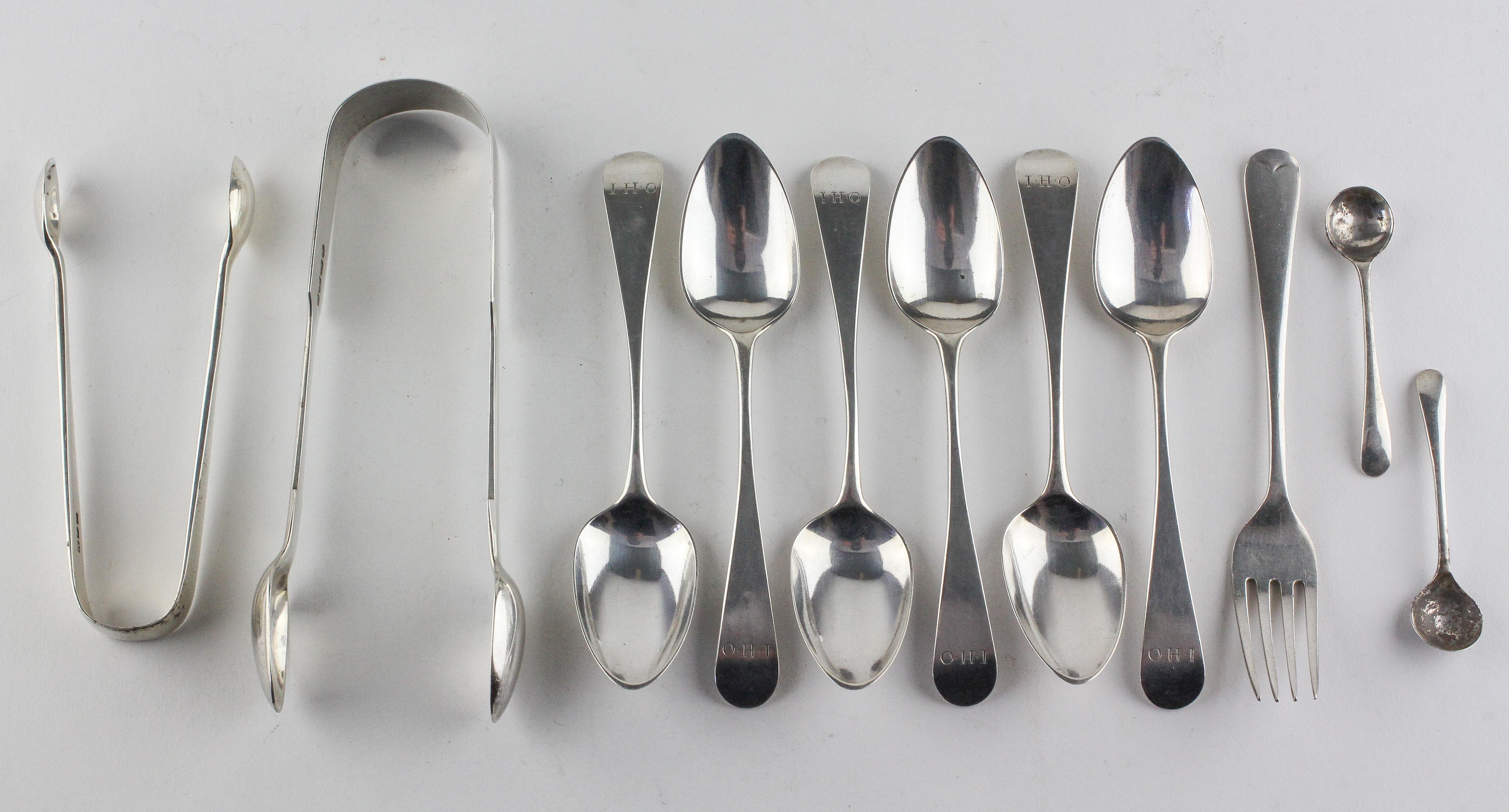 A selection of silver flatware, including a set of six Georgian teaspoons,