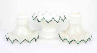 A set of three vintage white glass frilled lamp shades, from White Ladies Road, Picture House,