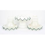 A set of three vintage white glass frilled lamp shades, from White Ladies Road, Picture House,
