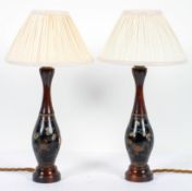 A pair of Japanese cloisonne and turned vase lamp bases, late 19th/early 20th century,