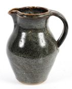 A Muchelney (John Leach) Studio pottery ewer, impressed uppercase mark,