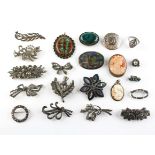 A collection of jewellery to include eighteen brooches of variable designs