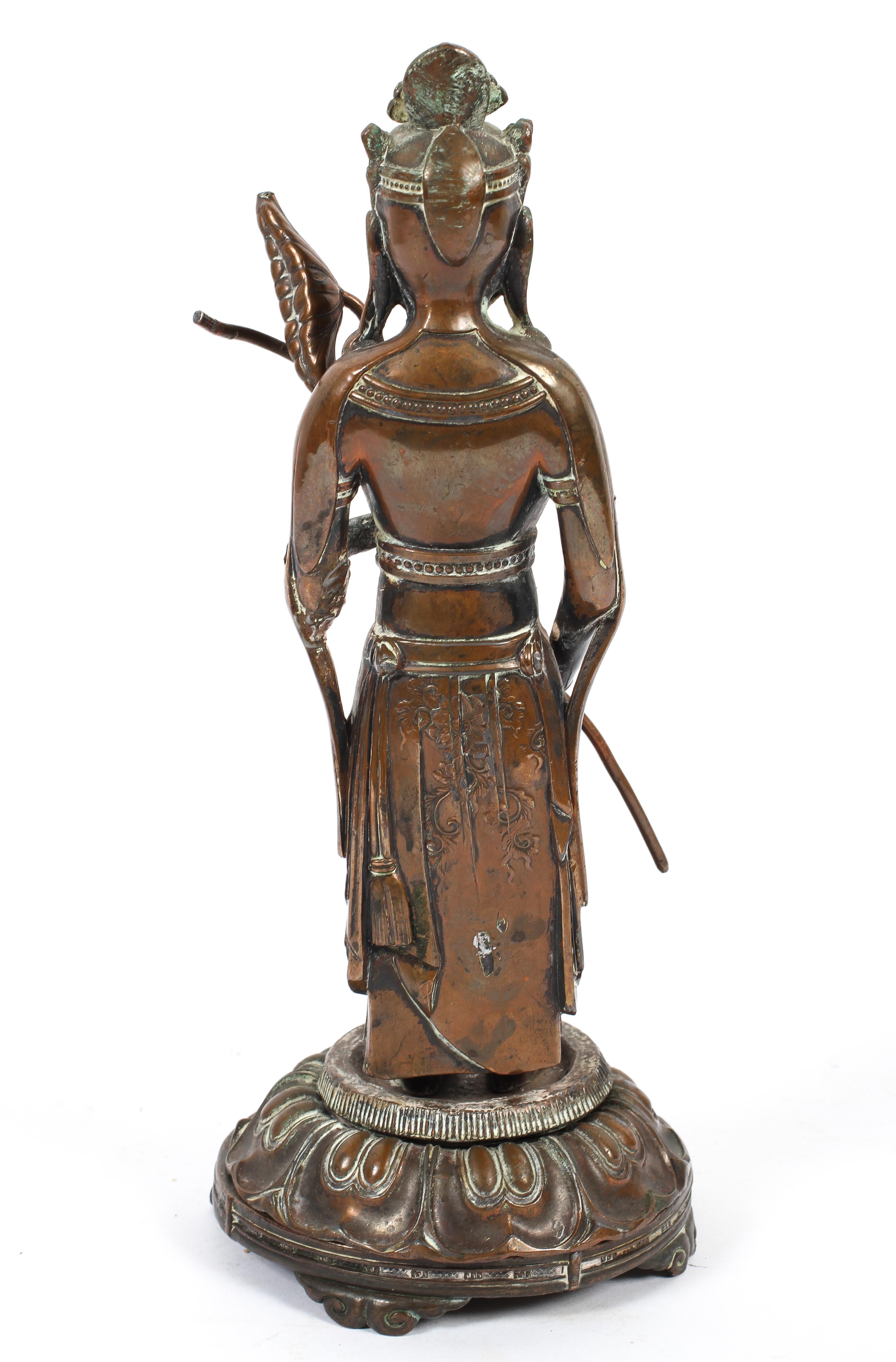 A South East Asian bronze figure of a Hindu deity holding a flower spray, - Image 2 of 2