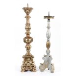 Two renaissance style pricket candlesticks, one gilded the other silvered,